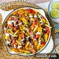 Featured image of Loaded Steak Fries with grilled steak, melted cheese, and fresh toppings.