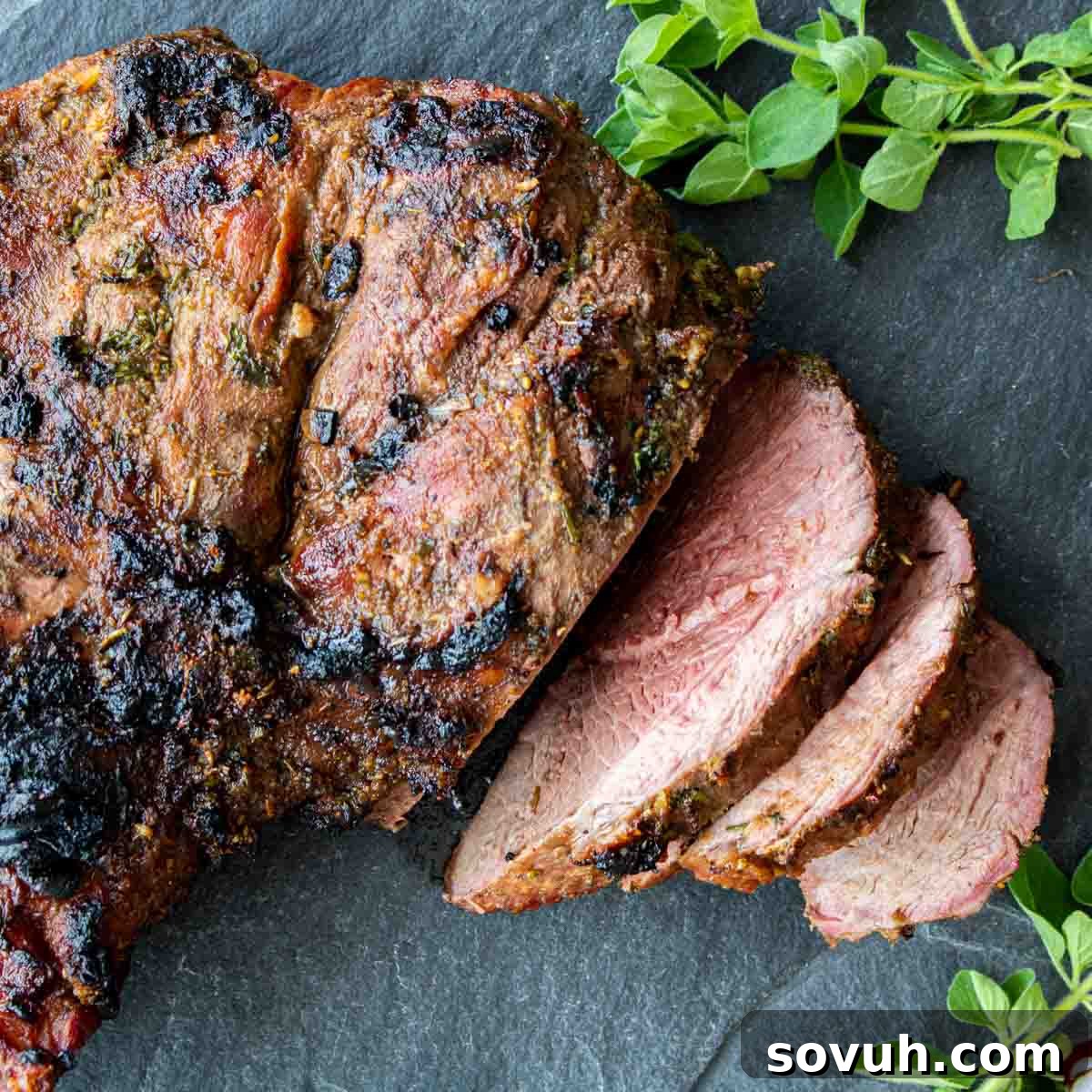 Top down picture of sliced, grilled leg of lamb