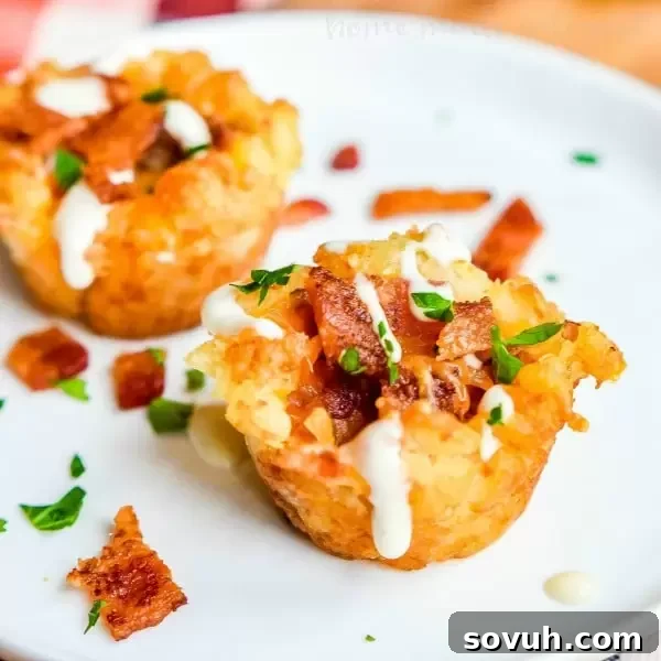Loaded Tater Tot Bites: Crispy tater tot cups filled with bacon, cheese, and sour cream. Perfect easy game day appetizer or football party food.