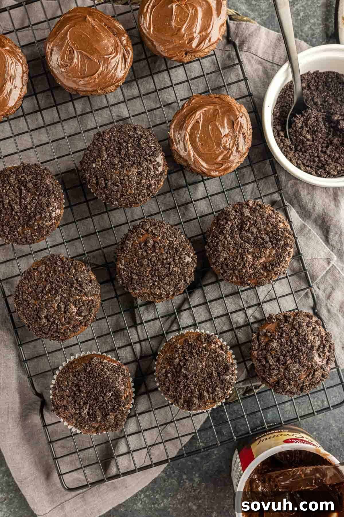 Image demonstrating how to frost and decorate Ghost Goo Halloween Cupcakes