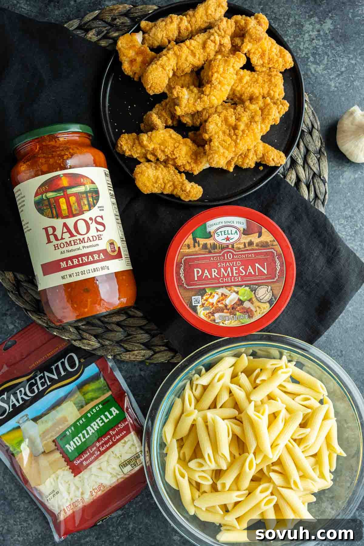 Cheesy Chicken Parm Bake 3 The five essential ingredients for Chicken Parmesan Casserole: breaded chicken, penne pasta, mozzarella, Parmesan cheese, and pasta sauce.