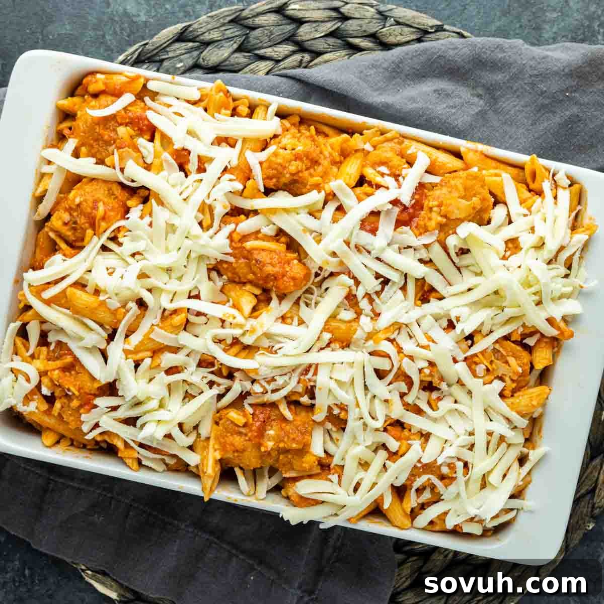 Cheesy Chicken Parm Bake 5 Assembled Chicken Parmesan Casserole in a baking dish, ready for the oven.