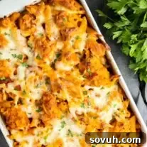 Cheesy Chicken Parm Bake 8 Chicken Parmesan Casserole in a baking dish, ready to serve.