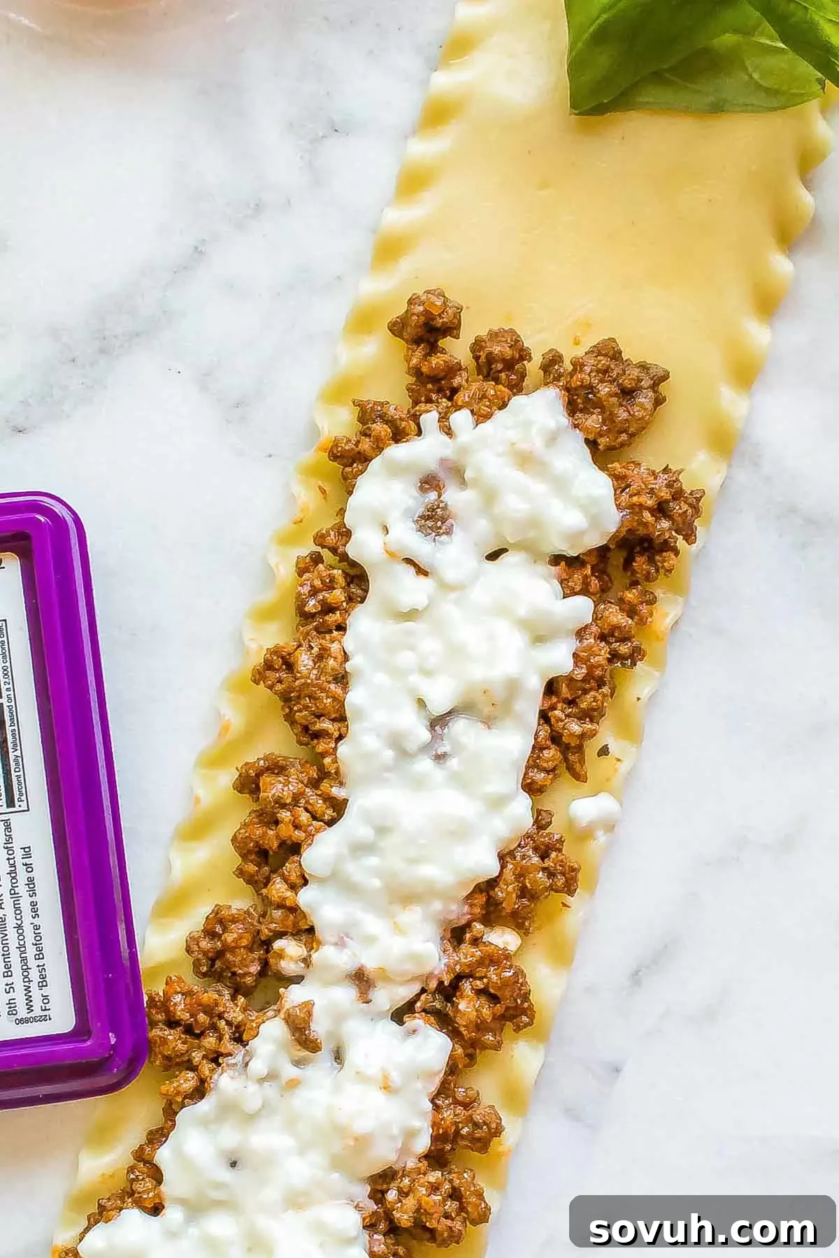 Close-up of the delicious filling inside a Lasagna Roll Up