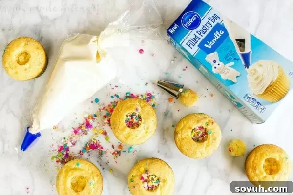 filling funfetti cupcakes