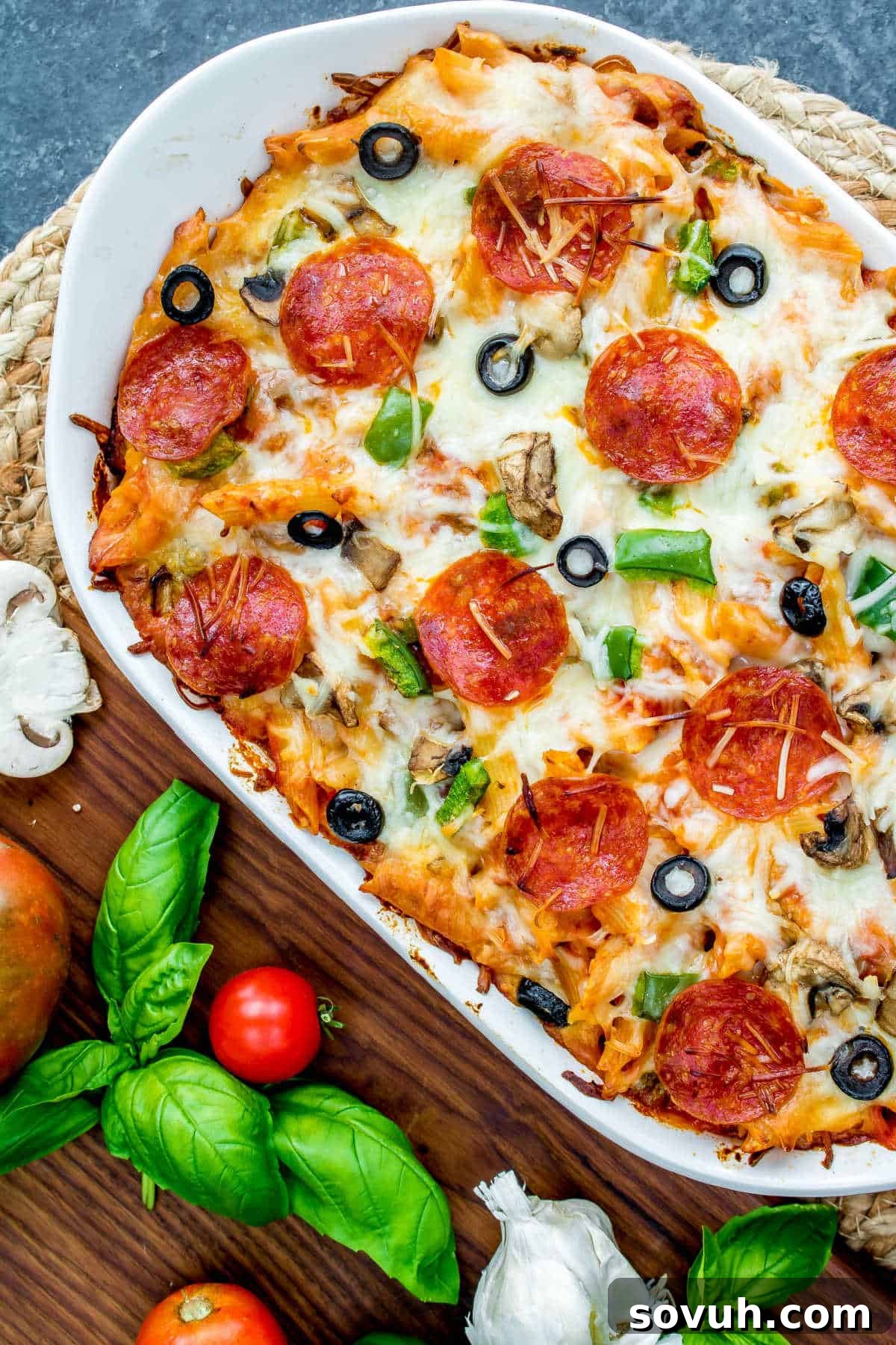 pizza casserole in a white casserole dish