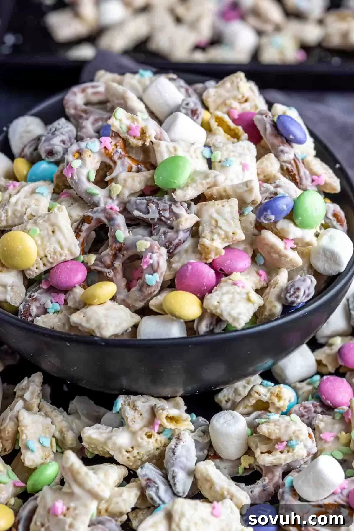 Close-up of Bunny Bait snack mix with pastel marshmallows and M&M's