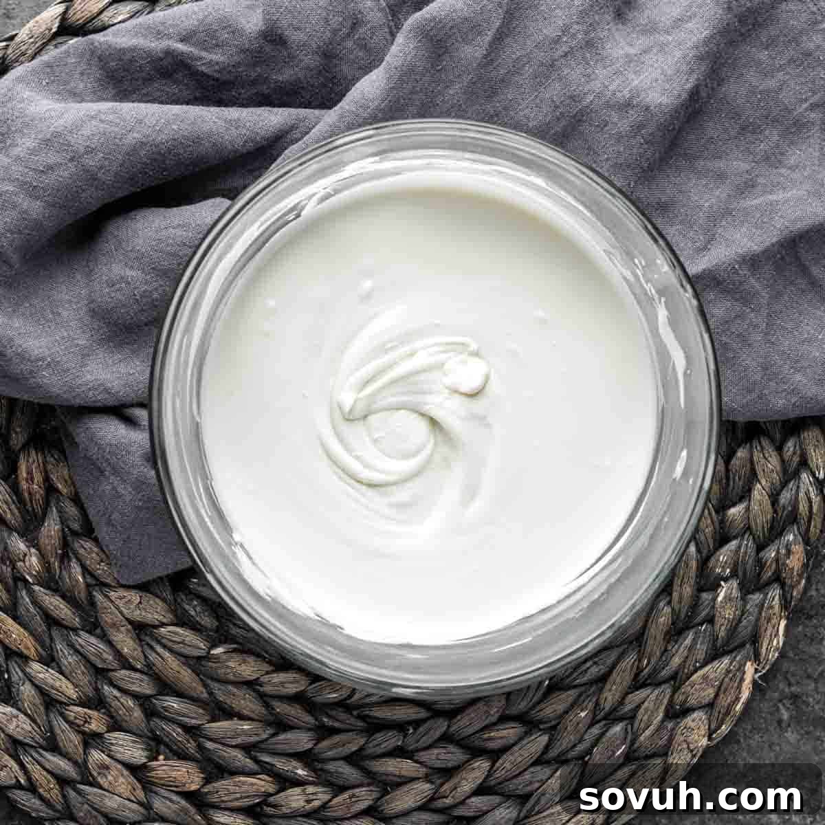 Melted white chocolate candy melts in a bowl for coating Bunny Bait