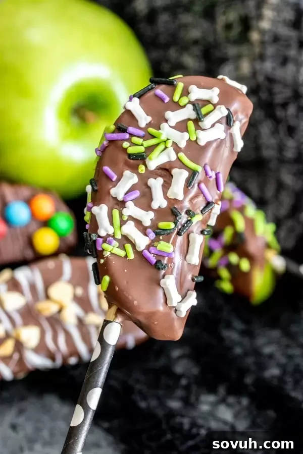 Halloween Chocolate Covered Apple Kabobs, a delightful and colorful dessert