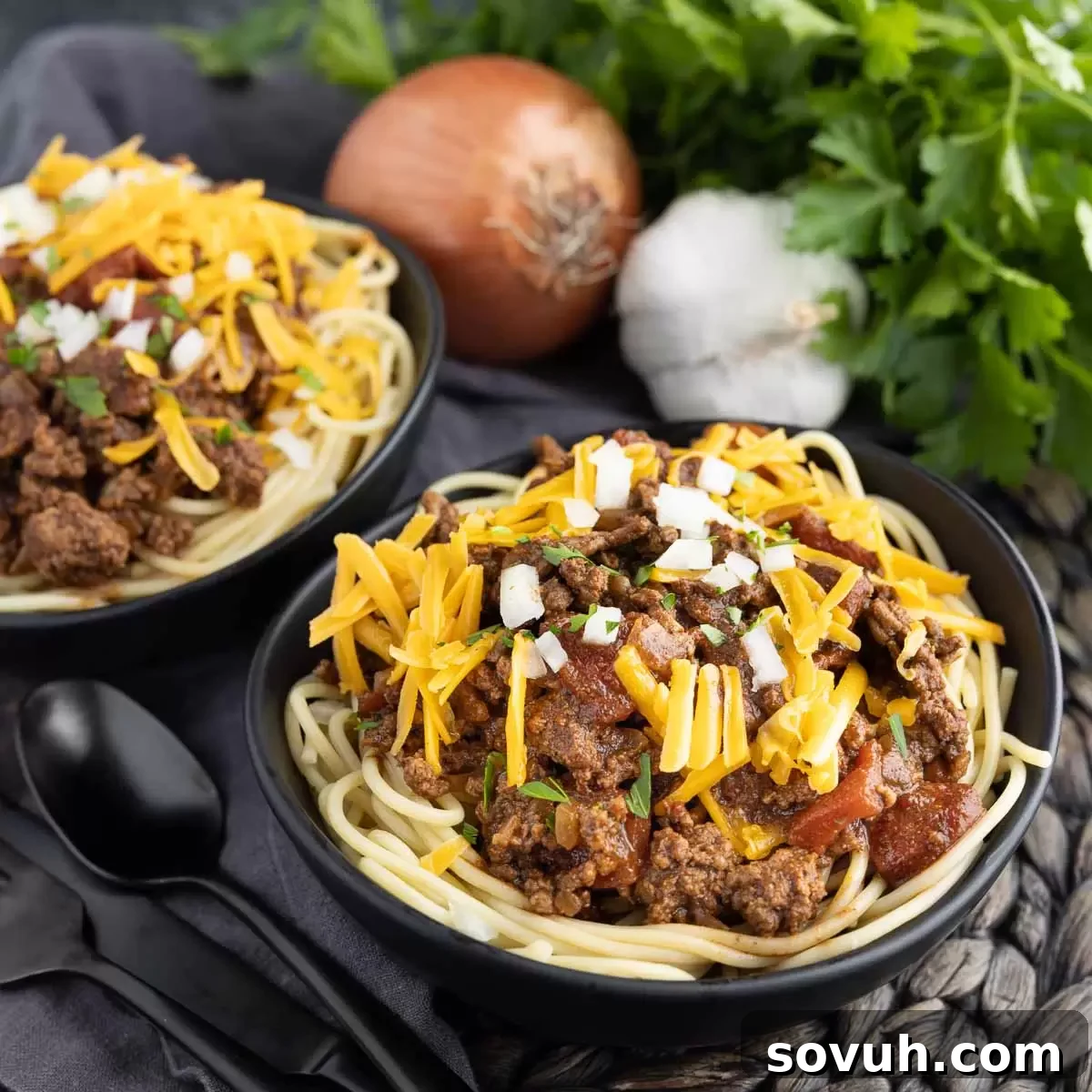 two black bowls of Cincinnati Chili