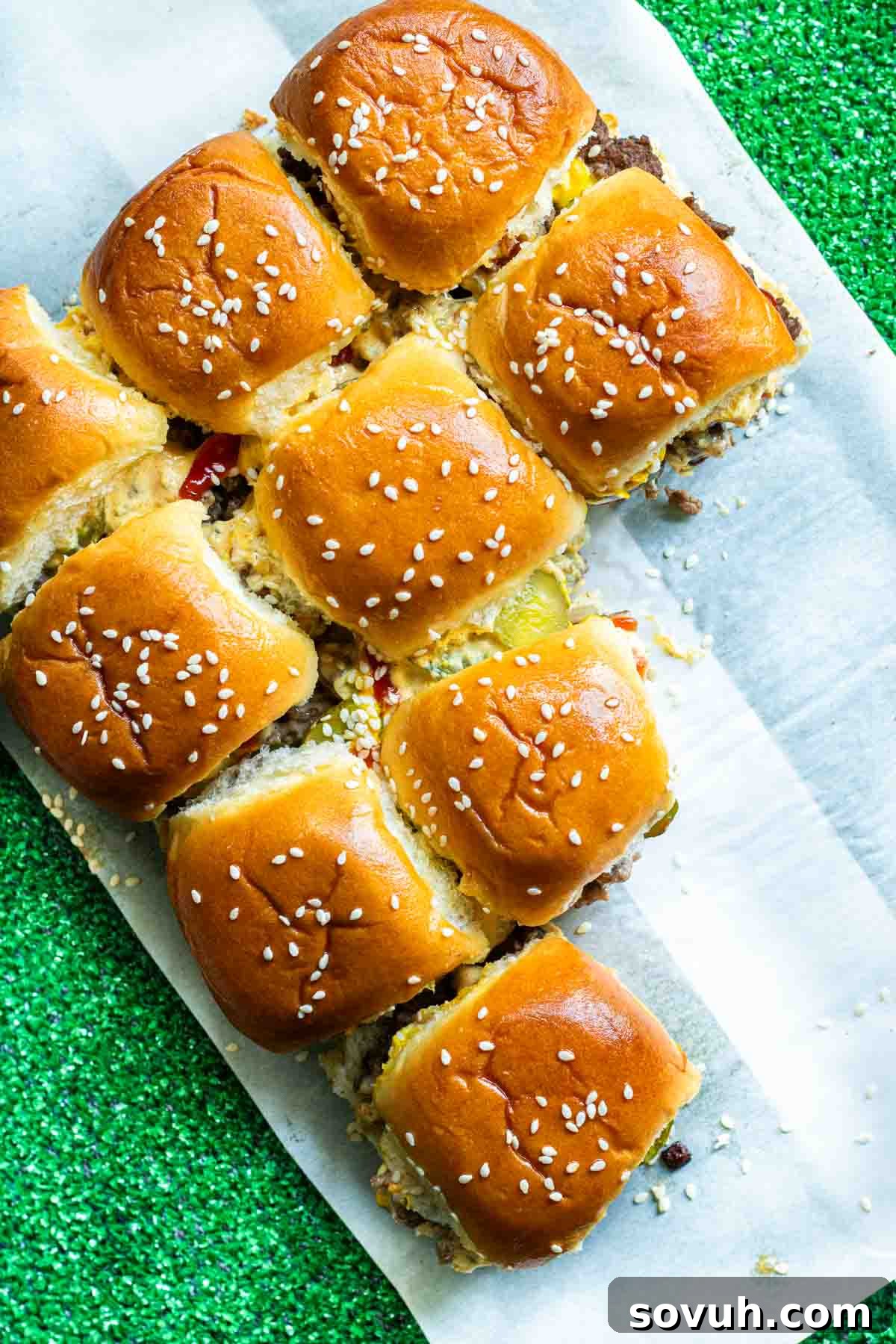 Homemade Big Mac Minis 4 A plate of Copycat Big Mac Sliders, glistening with secret sauce and topped with sesame seeds.