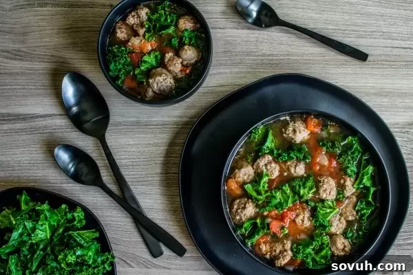 Bowls of healthy low carb sausage and kale soup ready to serve