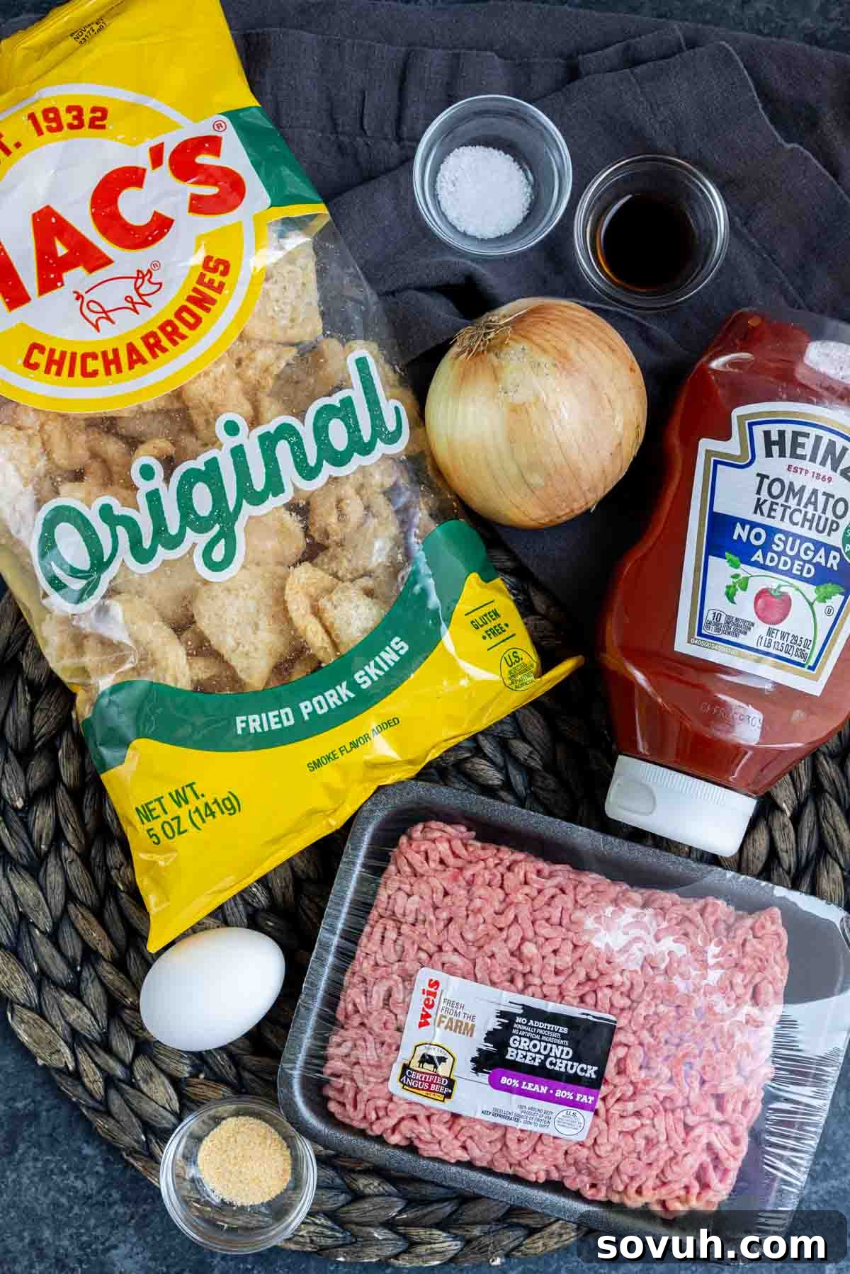 The ingredients for keto meatloaf are laid out on a platter.