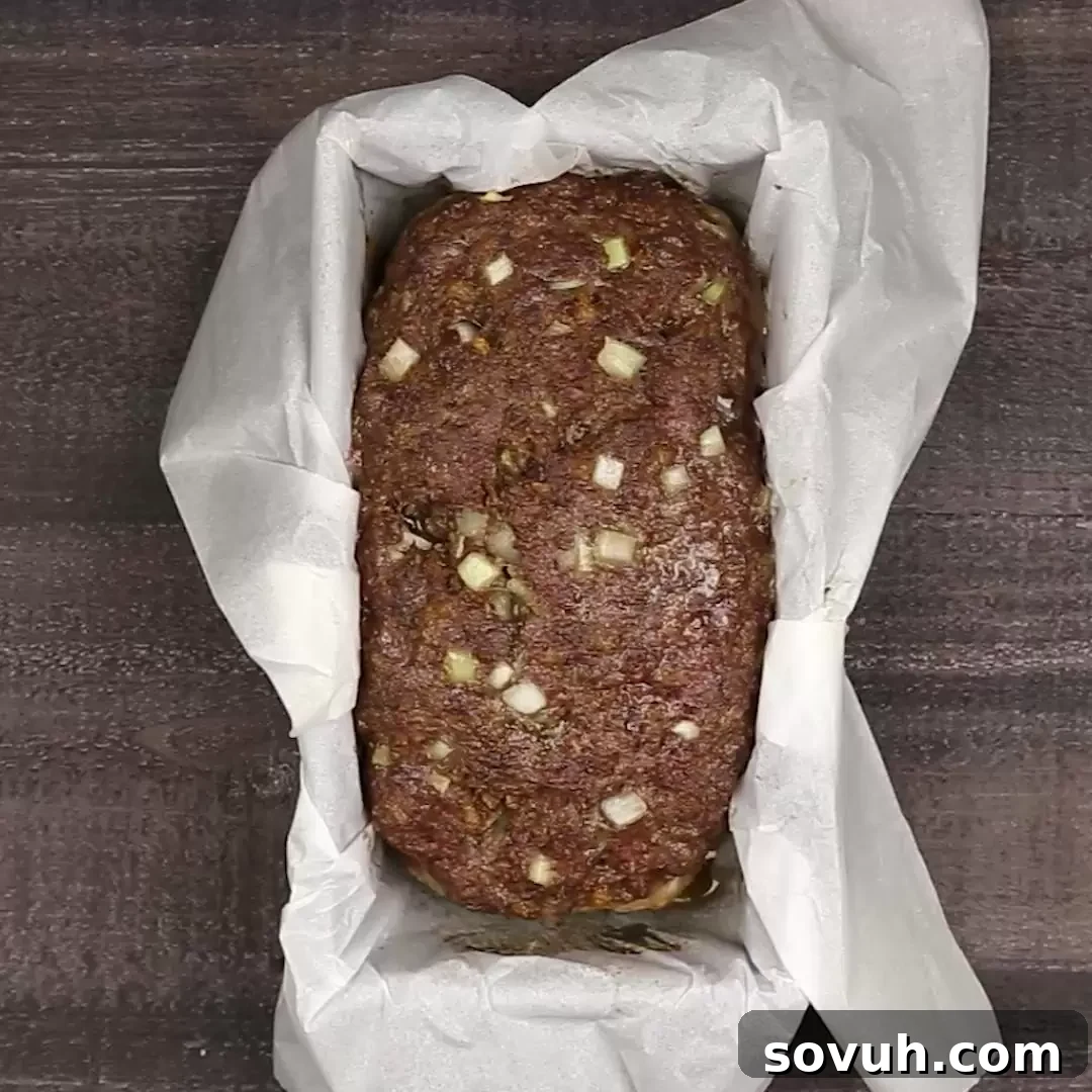 keto meatloaf sitting on a wooden table.