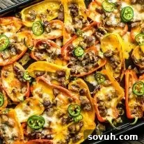 low carb nachos filled with carne asada, cheese, and jalapenos,.