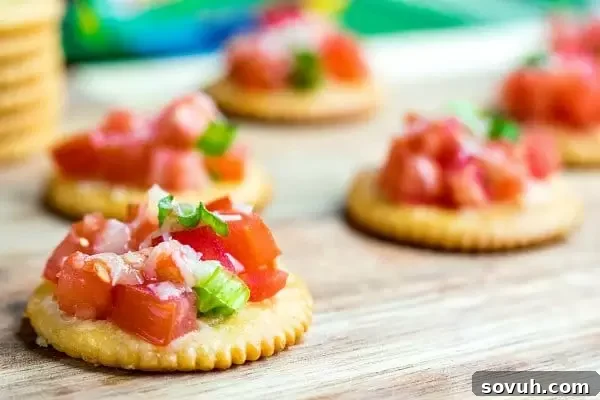 RITZ Bruschetta Toppers ingredients on a cutting board