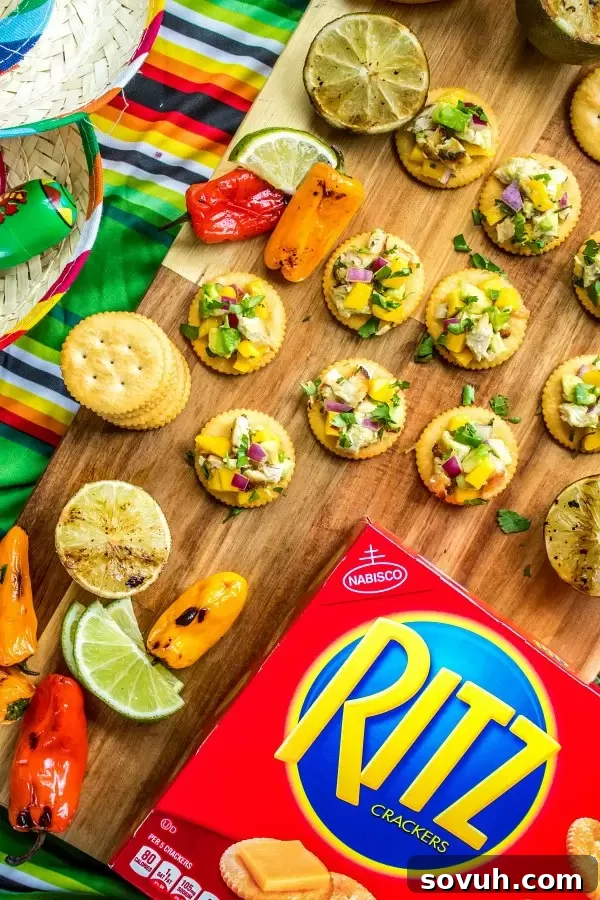 RITZ crackers topped with Mango Chicken Salad on a festive Cinco de Mayo party table