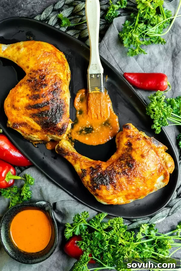 Spicy Portuguese Peri Peri Chicken, a low-carb chicken recipe marinated in a homemade sauce and ready for grilling or baking.