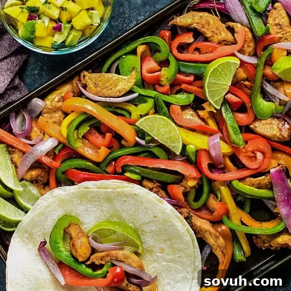 Delicious Sheet Pan Chicken Fajitas with warm tortillas ready to serve