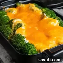 Broccoli Cheese Casserole in black casserole dish