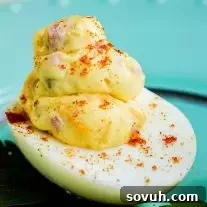 Mississippi Sin dip filled deviled eggs, showcasing the rich filling and garnish