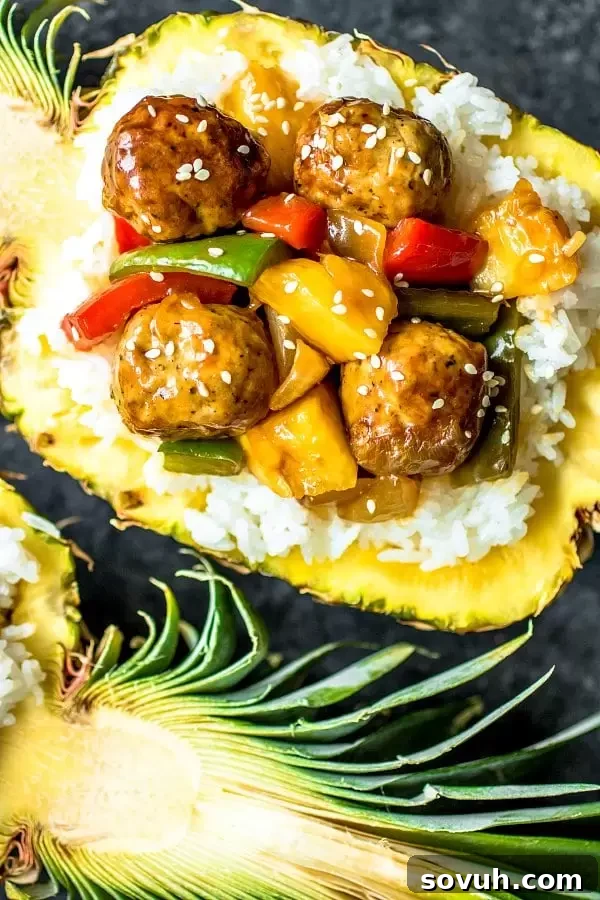 Pineapple Teriyaki Meatballs in a pineapple bowl