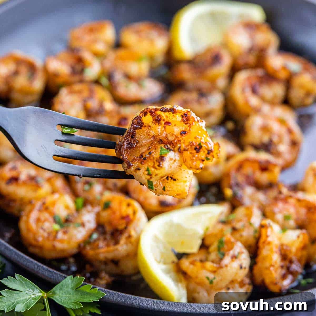 Sizzling Chili Garlic Shrimp 2 Gambas Pil Pil, succulent shrimp swimming in a vibrant chili garlic oil, ready to be enjoyed as a Spanish tapa or a quick dinner.