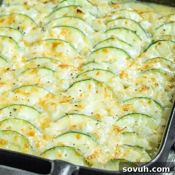 Delicious low-carb cheesy Zucchini Casserole in a baking dish, ready to be served