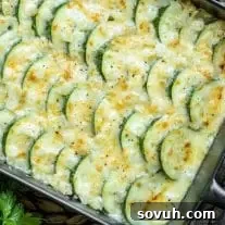 Low carb Zucchini Casserole, served in a white dish