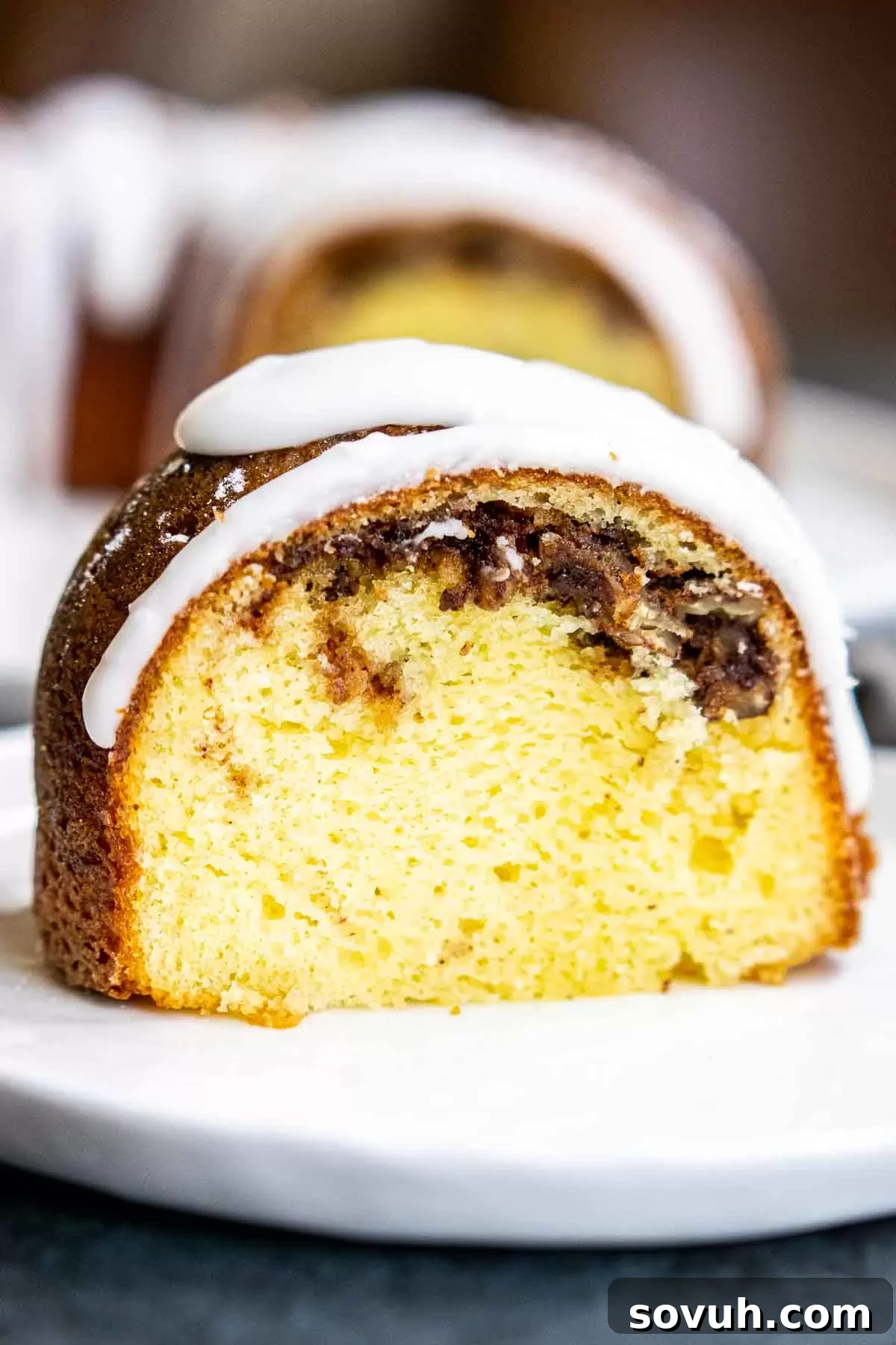 Sock it to Me Cake slice on a white plate