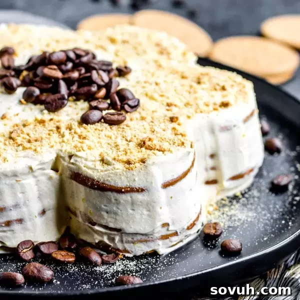 Bolo de Bolacha biscuit cake decorated with coffee beans, a classic Portuguese no-bake dessert.
