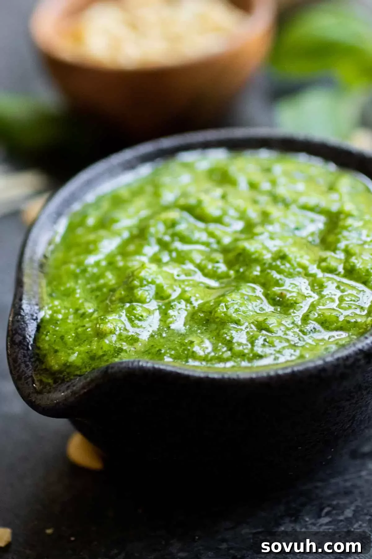 small black bowl of basil pesto