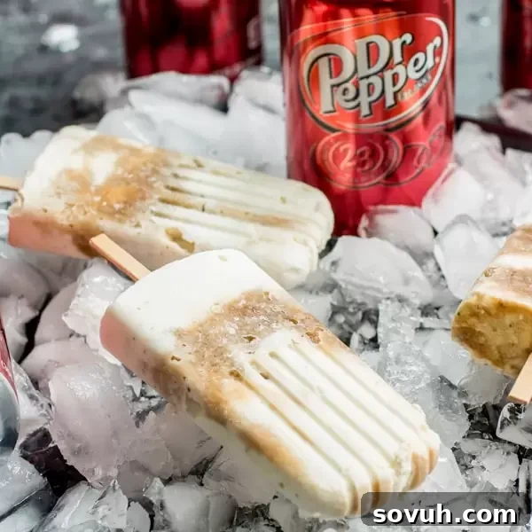 Dr. Pepper Popsicles on ice, ready to be served at a summer gathering.