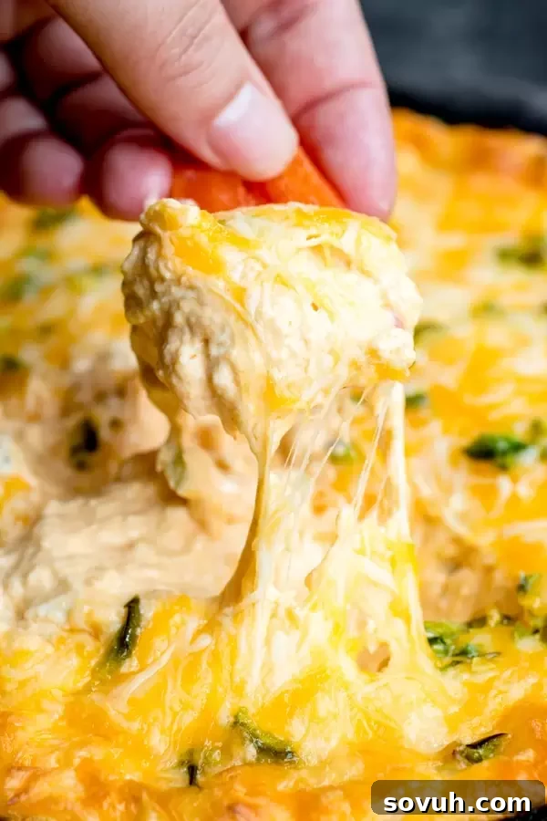 cheesy, golden brown Buffalo Chicken Jalapeno Popper Dip fresh out of the oven