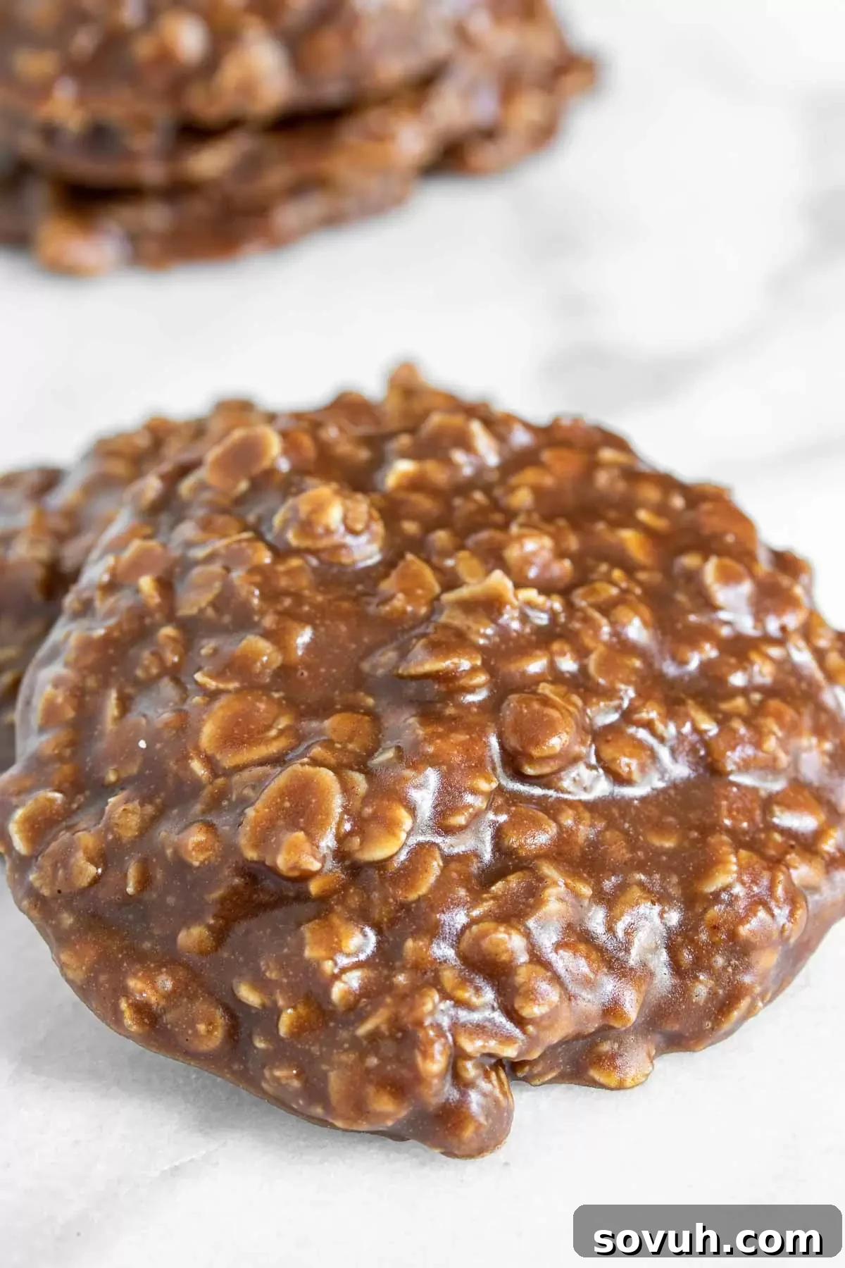 Close-up of No Bake Chocolate Oatmeal Cookies on a marble slab, ready to be served