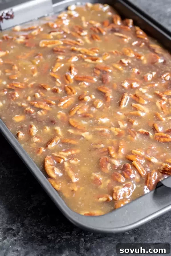 Pecan Pie Brownies filling being spread