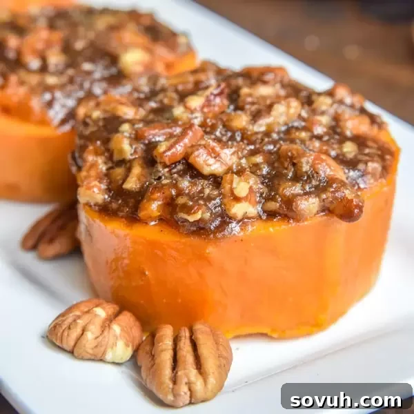 Mini Sweet Potato Casserole with a caramelized brown sugar and pecan topping, garnished with fresh herbs, ready to be served