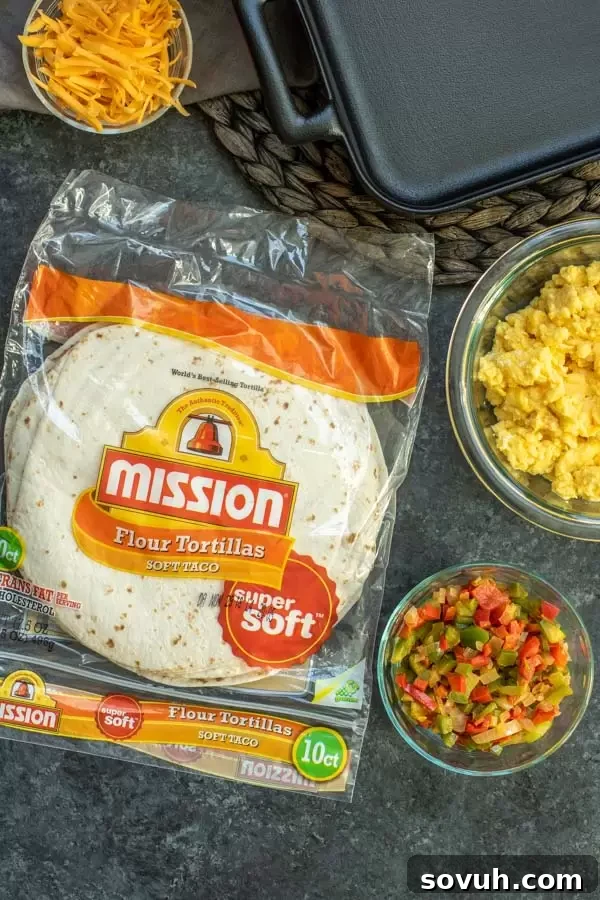 Ingredients laid out for making Breakfast Burrito Casserole