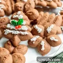Chocolate Spritz Cookie on a white platter
