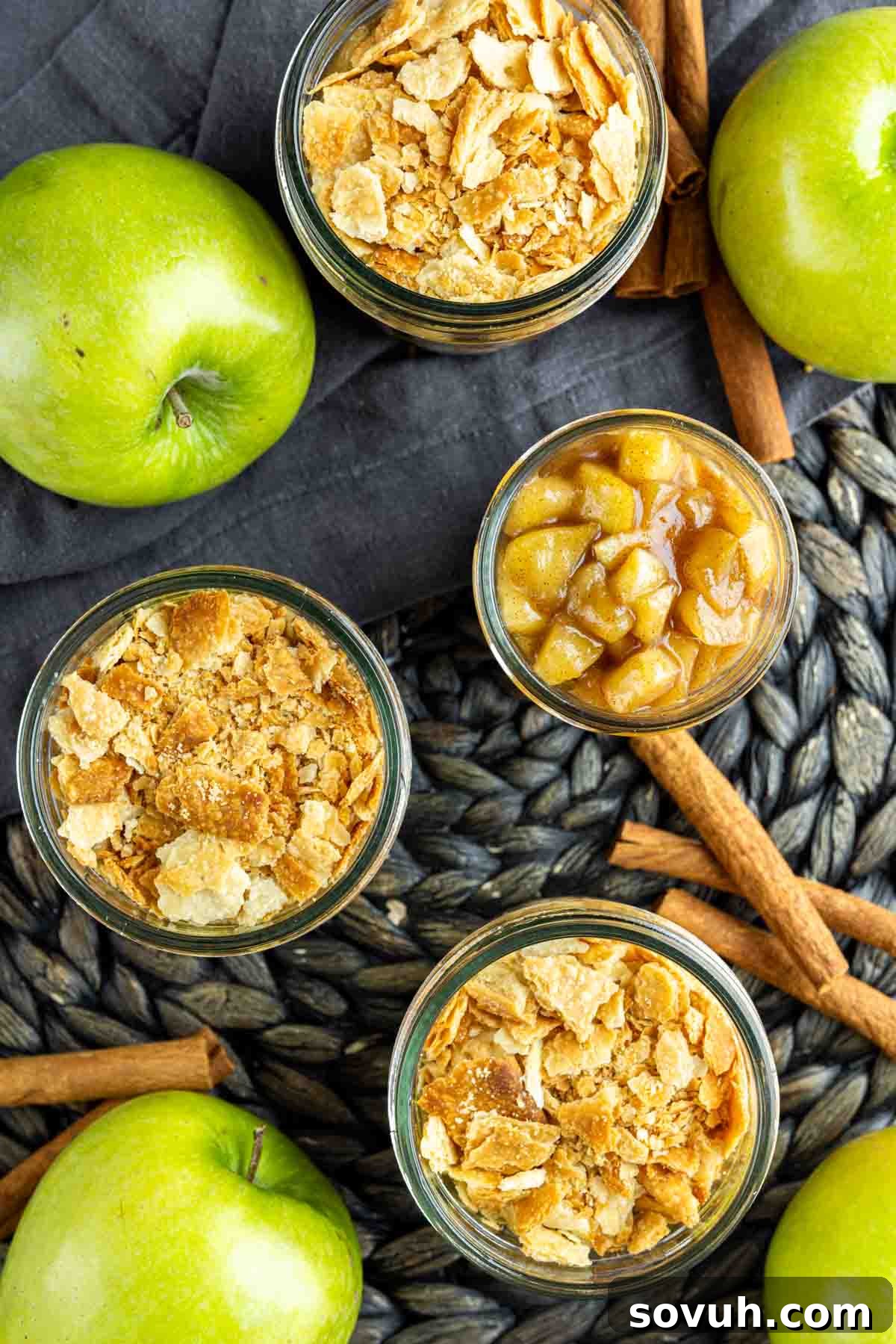 apple pie in a jar with cinnamon and apples.