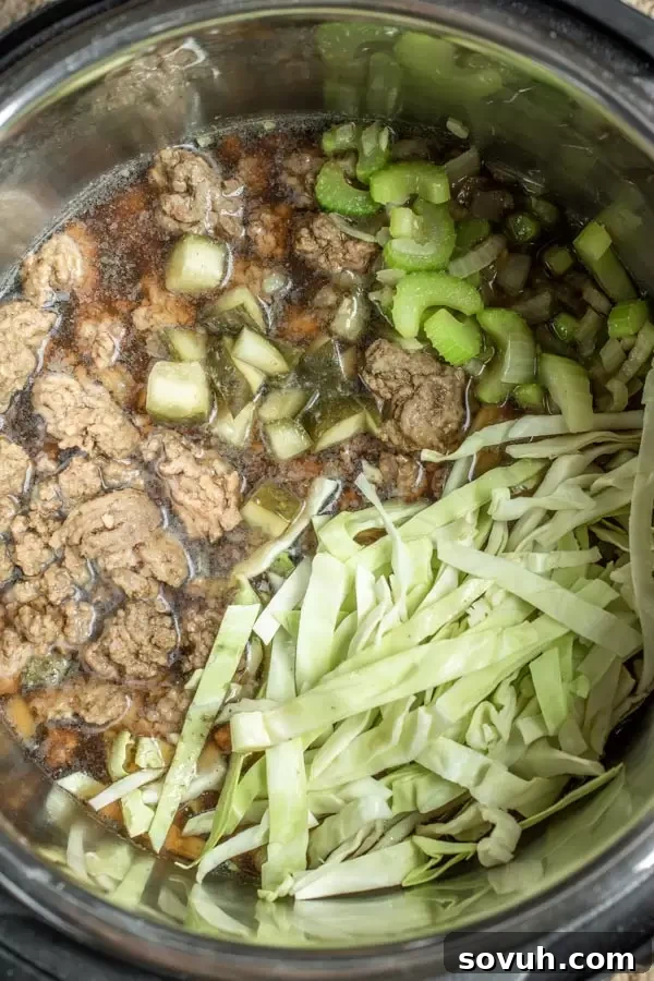 A flat lay image showing all the ingredients for Instant Pot Big Mac Soup laid out on a cutting board.