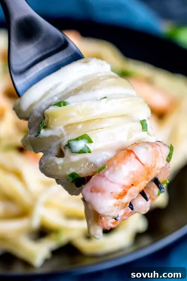 Easy creamy Shrimp Alfredo, generously sauced
