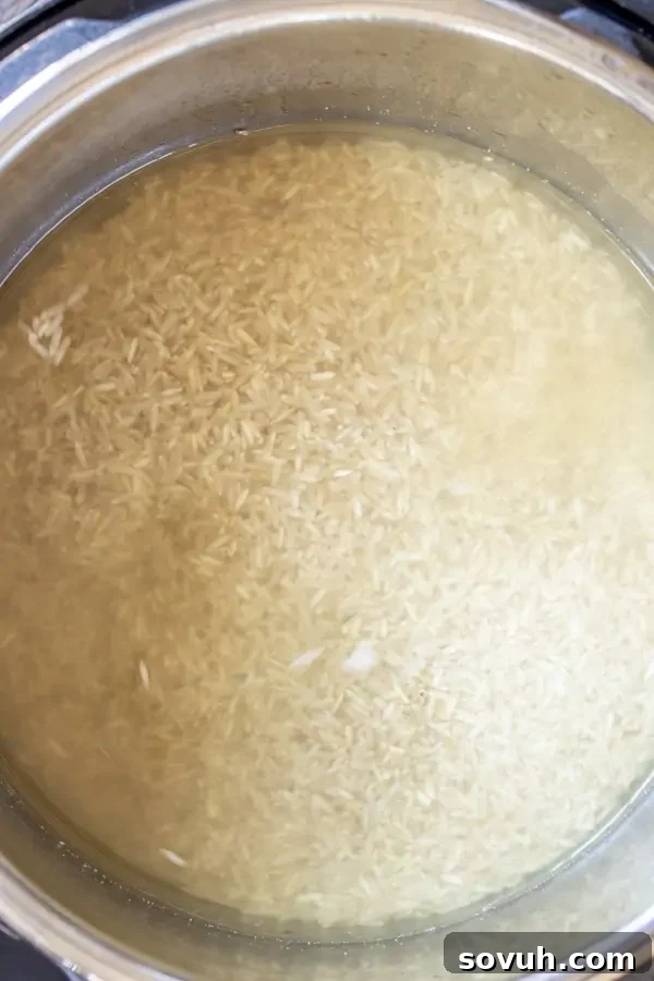 Step-by-step image showing brown rice and liquid in an Instant Pot.