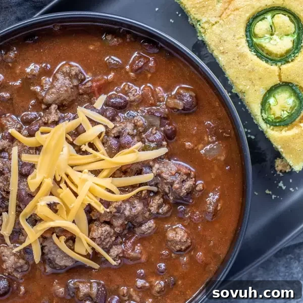 game day Instant Pot Chili - a blend of ground beef, beans, spices, and peppers cooked to spicy perfection in your Instant Pot