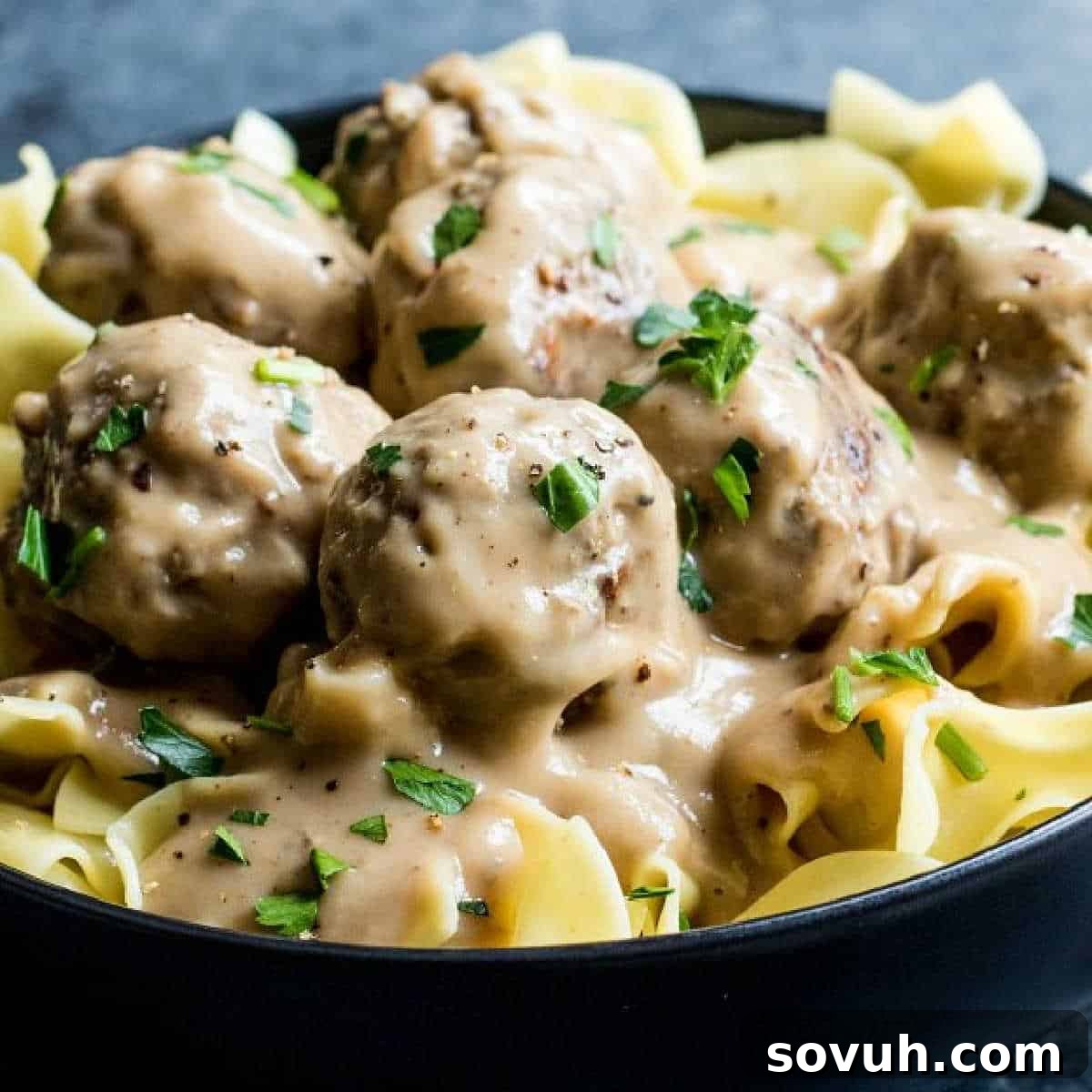 Pinterest image for Easy Swedish Meatballs - tender meatballs in creamy sauce