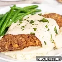 Chicken Fried Steak with Gravy on a white plate