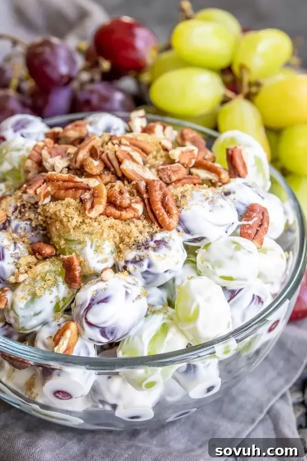 potluck Grape Salad topped with crunchy pecans