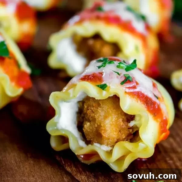 Bite-sized chicken parmesan lasagna roll-ups, golden and cheesy