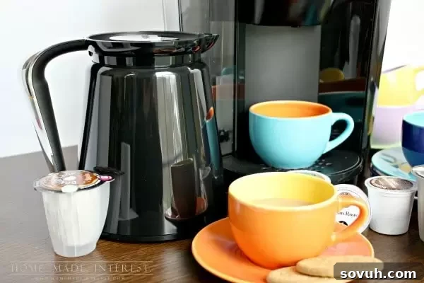 The Keurig 2.0 brewing system with a carafe filled with freshly brewed coffee, demonstrating its multi-serve capability.