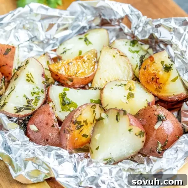 Perfectly Tender Foil Packet Garlic Potatoes Foil Packet Garlic Potatoes made in the oven, perfectly tender and packed with garlic and herb flavor